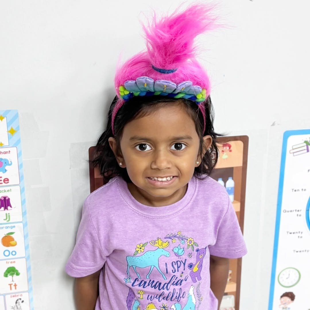 Child participating in a colorful special-day activity