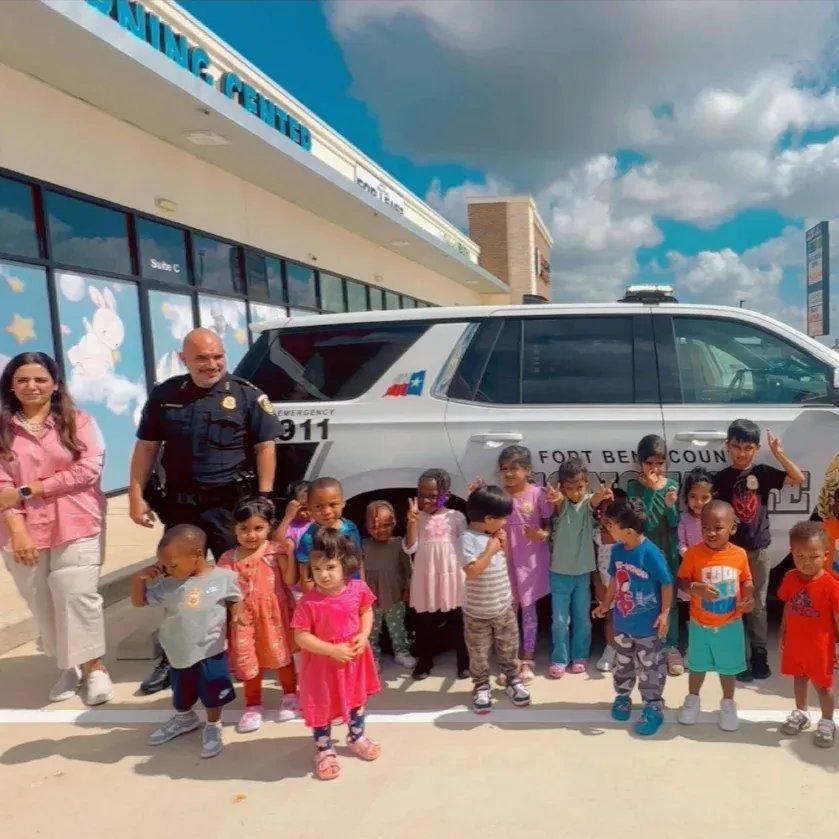Children and staff during an outdoor community visitor activity
